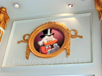 10セントコインを持つスクルージ