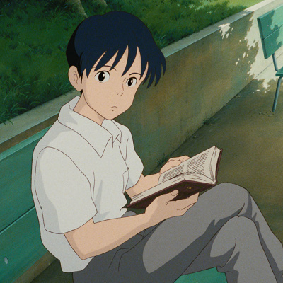 雫の借りた本を読む少年