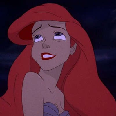 Bright young woman, sick of swimming, ready to stand.